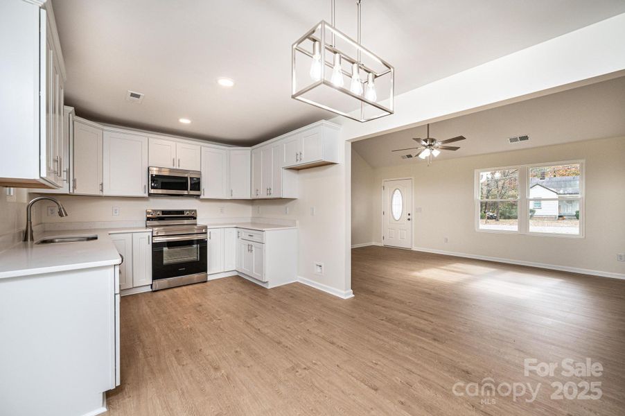 Spacious, unfurnished interior of a new home in , Hickory (Image 10).