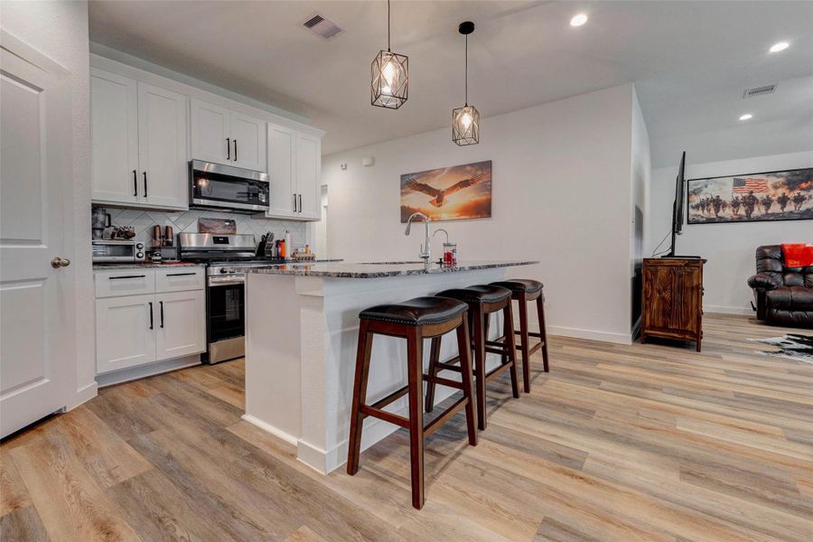 Furnished interior view inside a new home in Canterra Creek 45' and 50' Homesites, Iowa Colony (Image 14).