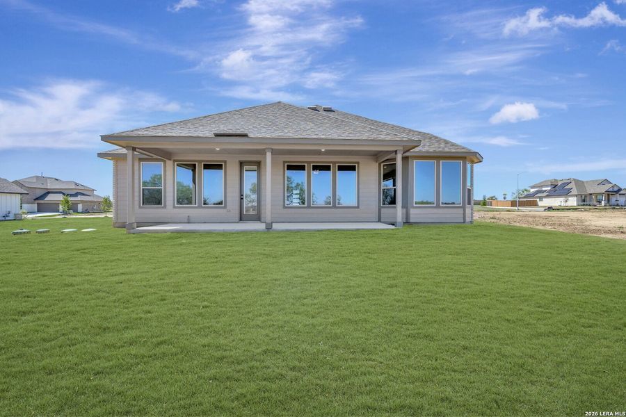 Exterior details and patio area of a home in Preserve at Annabelle Ranch, San Antonio (Image 25).