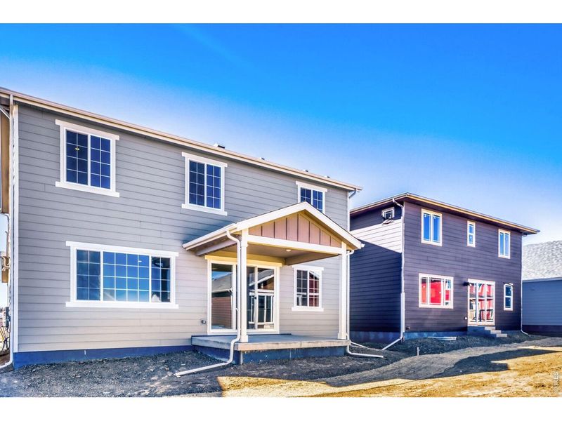 Exterior details and patio area of a home in Farmstead, Berthoud (Image 3).