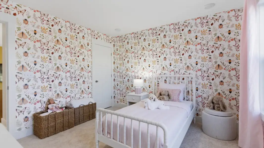 Elegant bedroom retreat featuring soft carpet and oversized windows that create a bright, welcoming space Pelham Crossing
