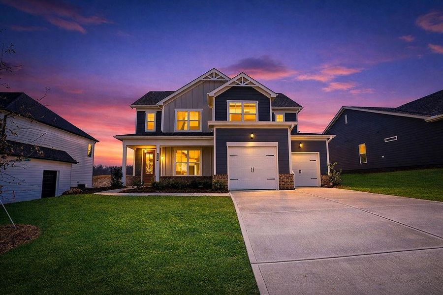 Front exterior of a new home in , Homer, GA, highlighting curb appeal (Image 18).