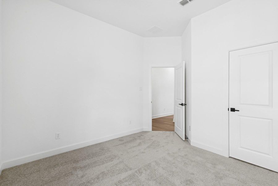 Spacious, unfurnished interior of a new home in Meridiana 55' Homesites, Manvel (Image 14).