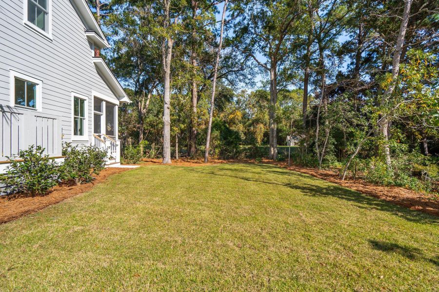 Exterior details and patio area of a home in , Johns Island (Image 47).
