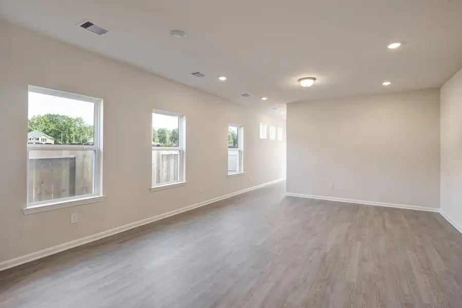 The Mockingbird II- Family Room and Dining Area The Mockingbird II- Family Room and Dining Area