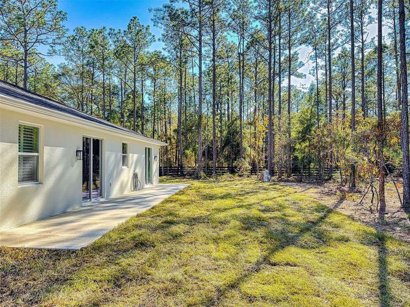 Exterior details and patio area of a home in , Ocala (Image 32).