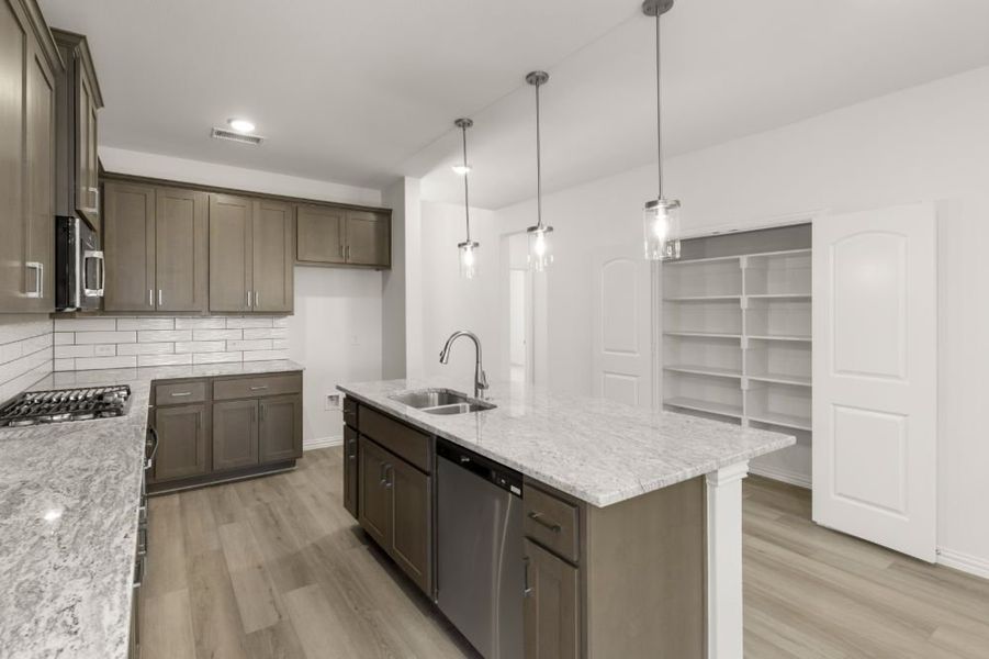 Representative furnished interior of a home built from the Cypress by UnionMain Homes in Edgewater, Fate (Image 9).