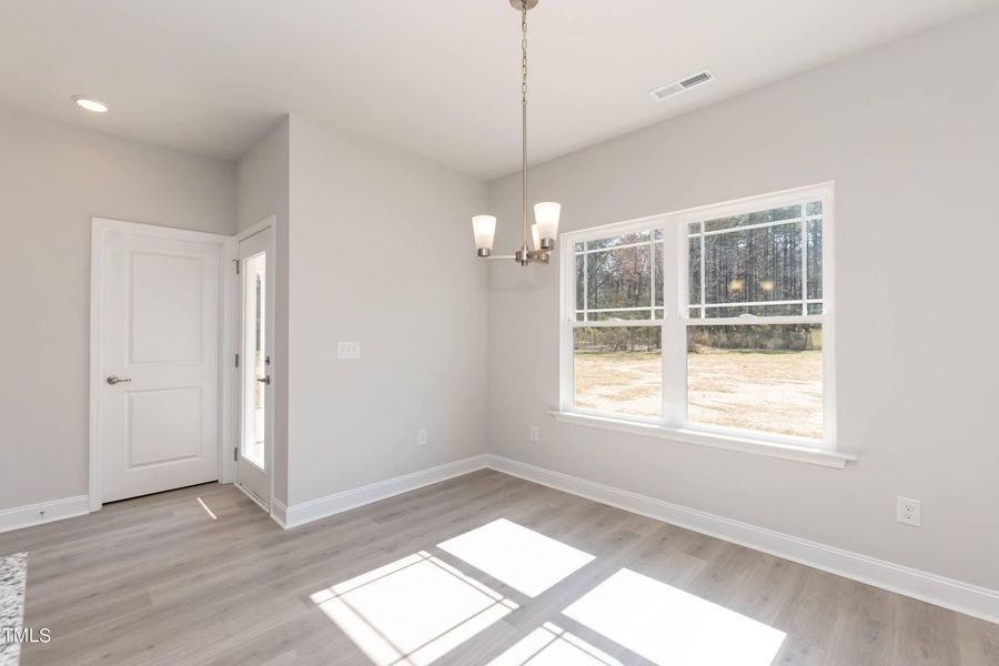 Representative unfurnished interior of a home built from the 2721 by Adams Homes in Hidden Pines, Cameron (Image 21).