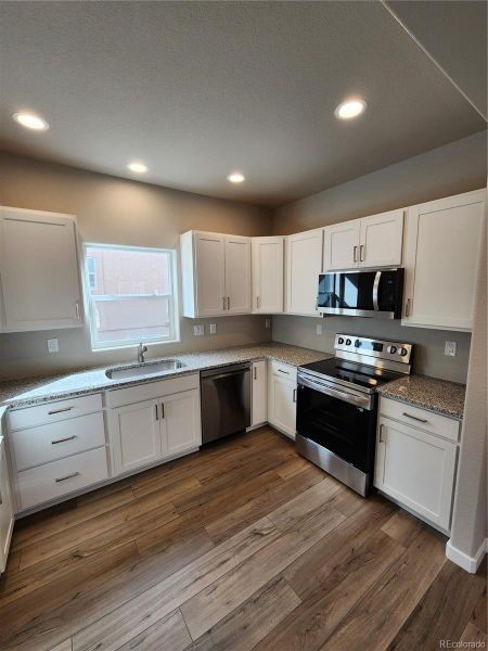 Furnished interior view inside a new home in , Colorado Springs (Image 9).