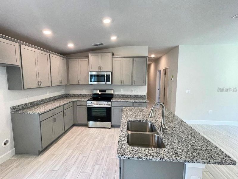 Furnished interior view inside a new home in Highland Hills, Hudson (Image 6).