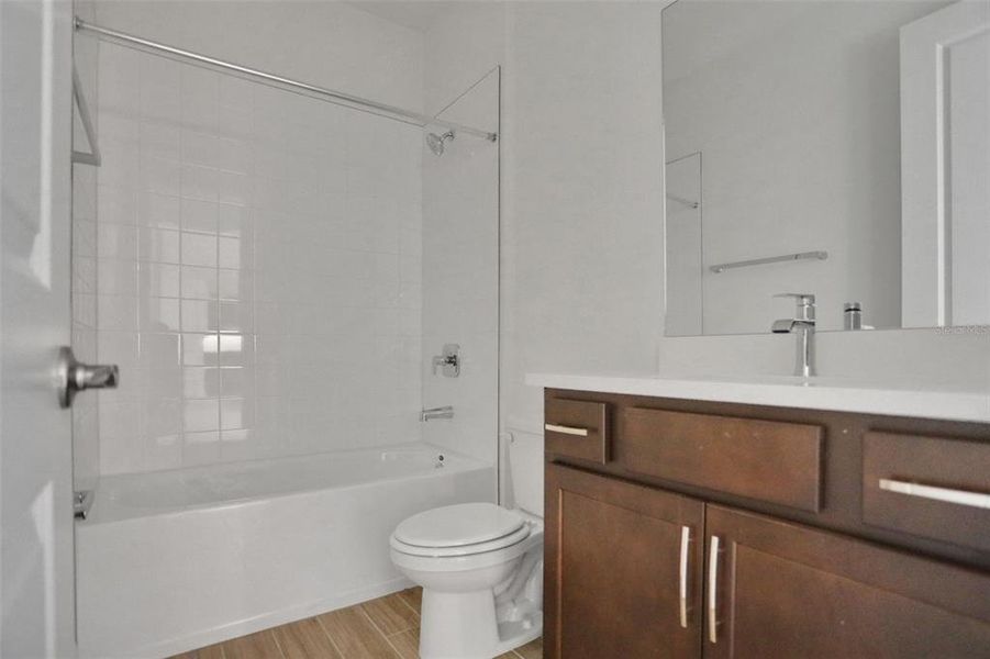 Furnished interior view inside a new home in Seaire, Parrish (Image 9).