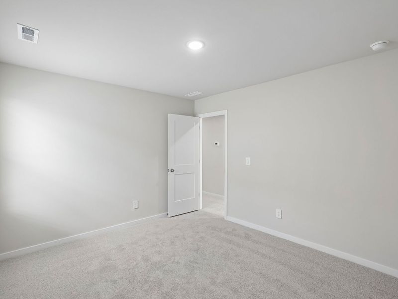 Spacious, unfurnished interior of a new home in Marshburn Landing - Bungalow Series, Wendell (Image 19).