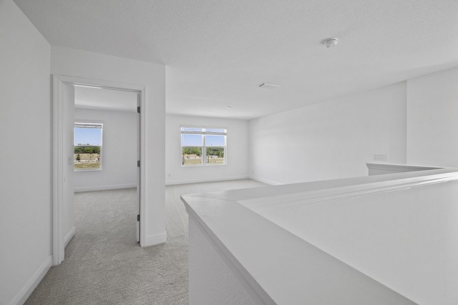 Representative unfurnished interior of a home built from the Newcastle by Risewell Homes in Trinity Lakes, Groveland (Image 6).