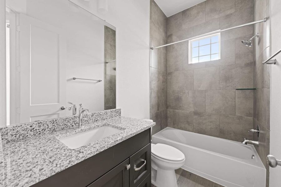 Representative furnished interior of a home built from the Rivers 60′ Lot by Chesmar Homes in Fulshear Lakes, Fulshear (Image 14).