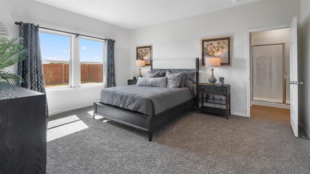 Bedroom with carpet and baseboards