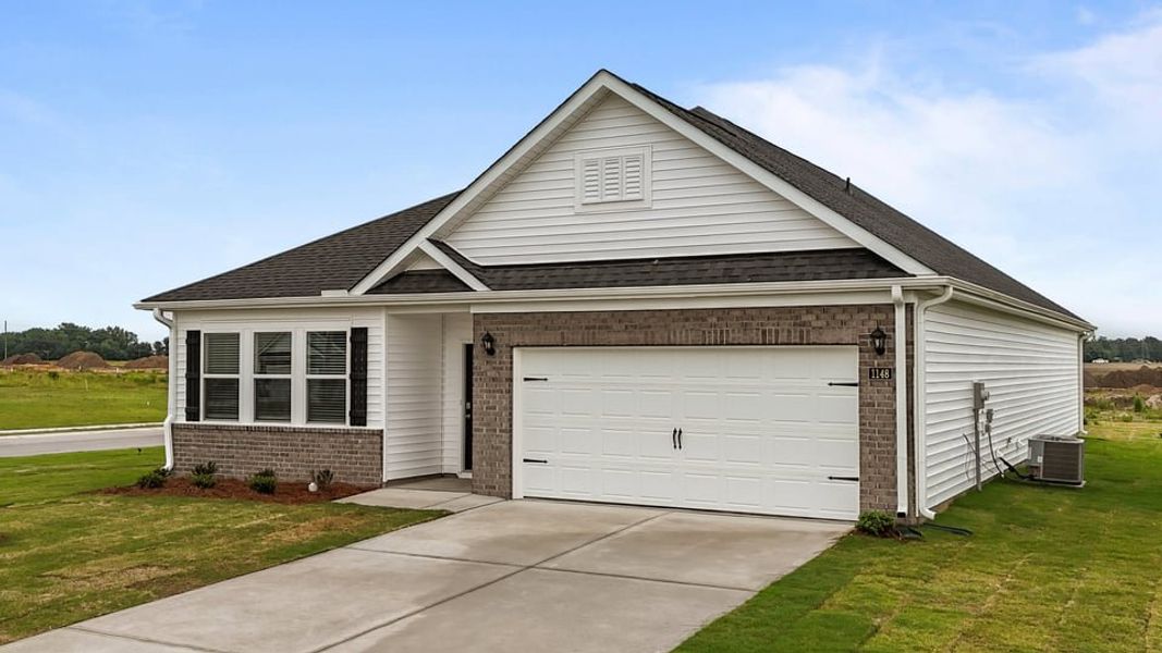 Front exterior of a new home in Cambridge Park, Mebane, NC, highlighting curb appeal (Image 2).