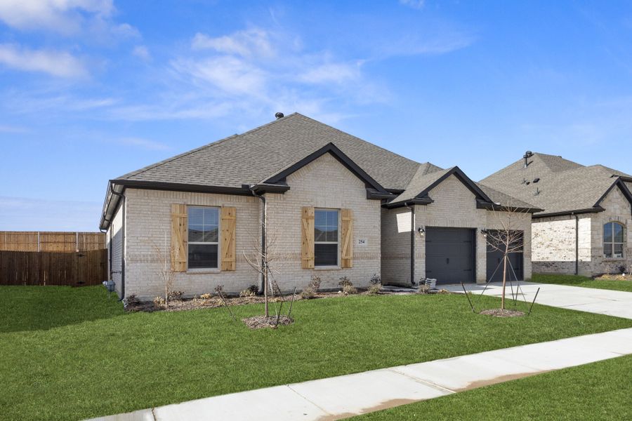 Representative exterior photo of a completed home built from the Westwood by Sandlin Homes in Lakesong, Midlothian, TX (Image 22).
