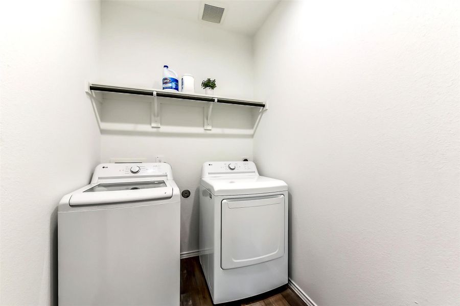 Furnished interior view inside a new home in Sunterra, Katy (Image 33).
