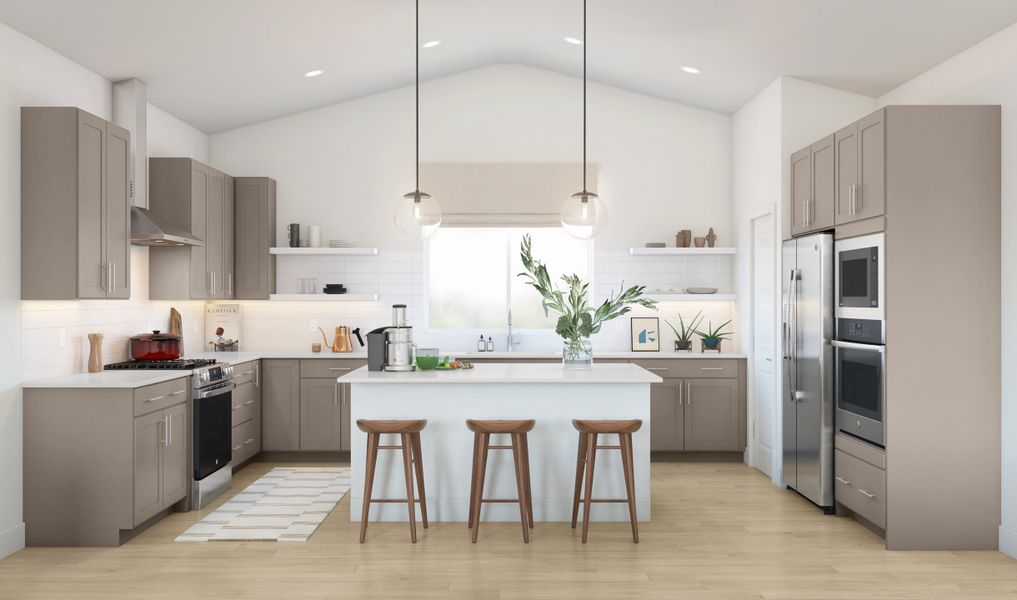 Kitchen with vaulted ceiling and pendant lighting