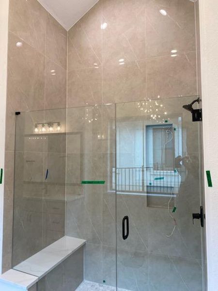 Full bathroom with a stall shower