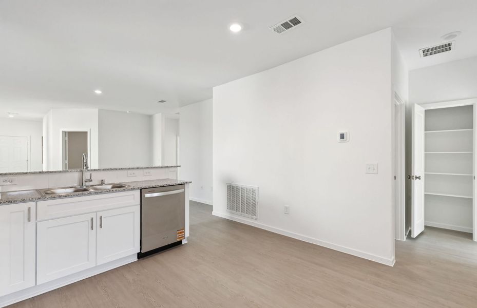 Furnished interior view inside a new home in Mavera, Conroe (Image 7).