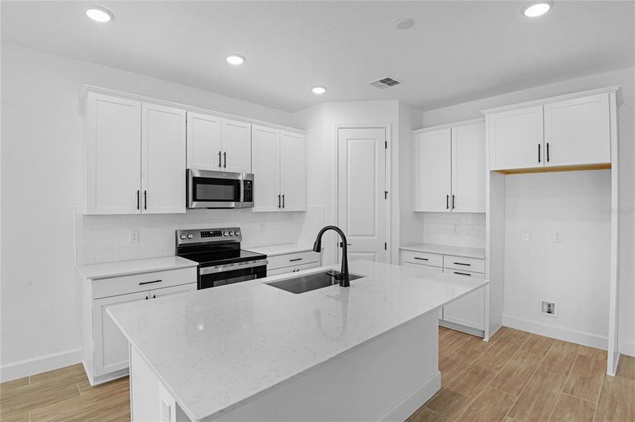 Furnished interior view inside a new home in , Tavares (Image 5).