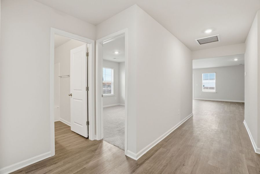 Representative unfurnished interior of a home built from the Spruce L by McGuinn Homes in Sibley Village, Sumter (Image 11).