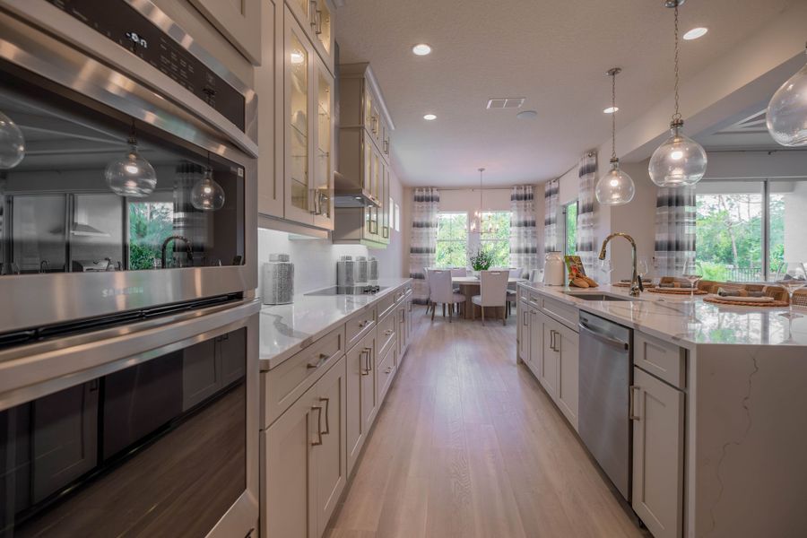 Representative furnished interior of a home built from the Ibis by Jones Homes USA in Legends Preserve, Daytona Beach (Image 10).