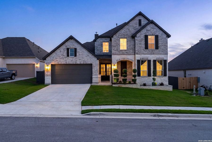 Front exterior of a new home in Ventana, Bulverde, TX, highlighting curb appeal (Image 31).