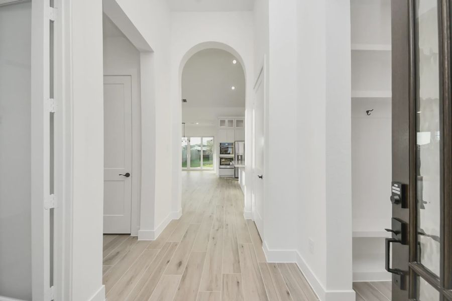 Representative unfurnished interior of a home built from the PT Bonneville by Chesmar Homes in Meridiana 50's and 60's, Manvel (Image 14).