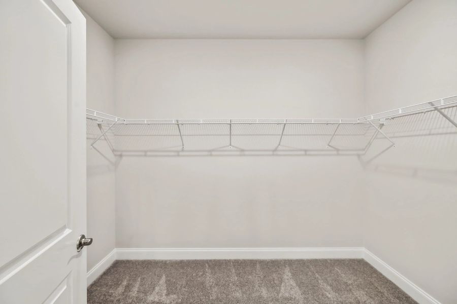 Primary Walk-in Closet | For representation purposes only. Options and layout may vary by community and home plan. Primary Walk-in Closet | For representation purposes only. Options and layout may vary by community and home plan.