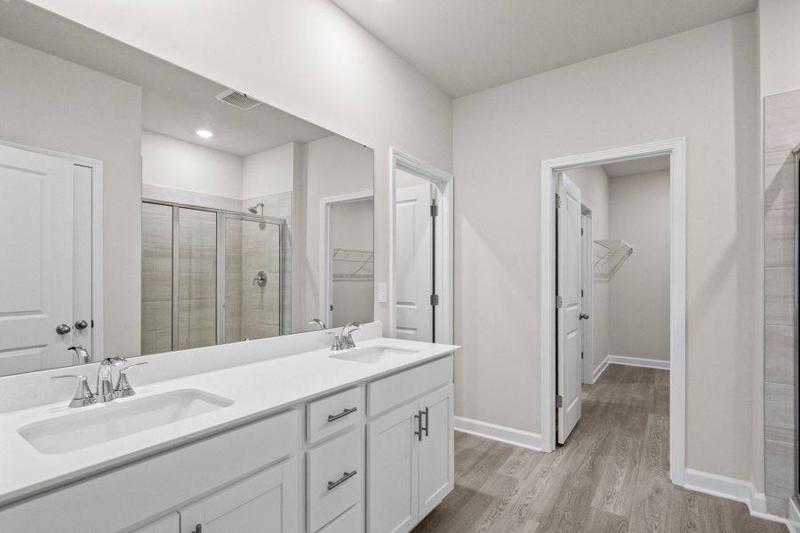 Furnished interior view inside a new home in Cypress Ridge - The Coastline Series, Longs (Image 10).