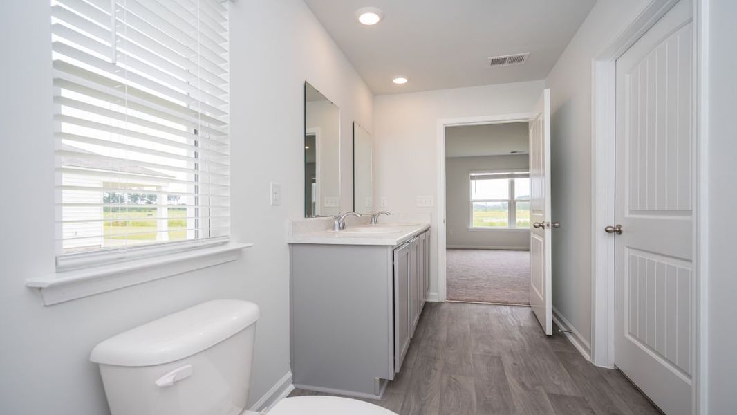 Representative furnished interior of a home built from the KERRY by D.R. Horton in Stanbury Creek, Supply (Image 11).