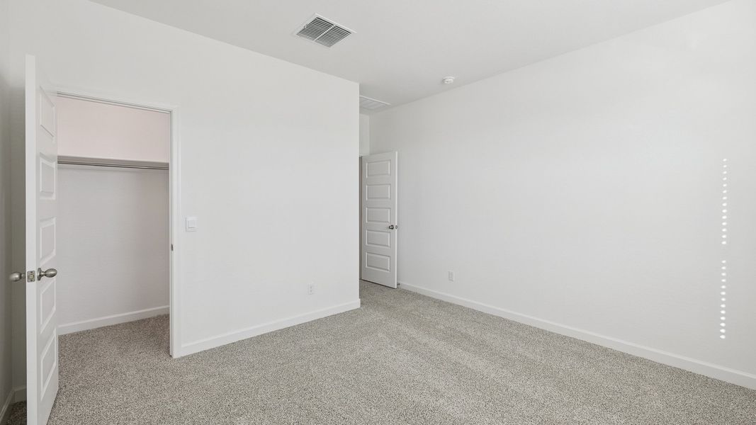 Spacious, unfurnished interior of a new home in Desert Moon Estates, Buckeye (Image 25).