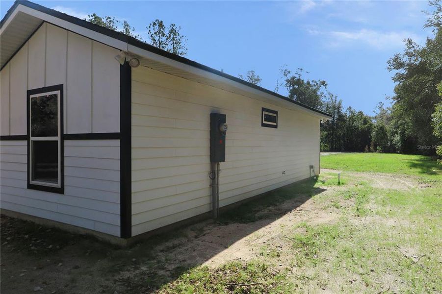 Exterior details and patio area of a home in , Hawthorne (Image 2). Exterior details and patio area of a home in , Hawthorne (Image 2).
