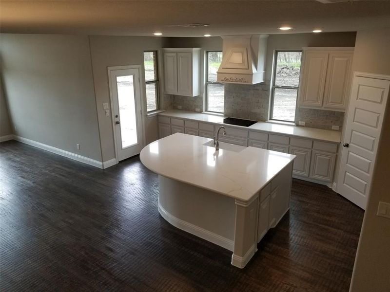 View of great room from landing on stairs.