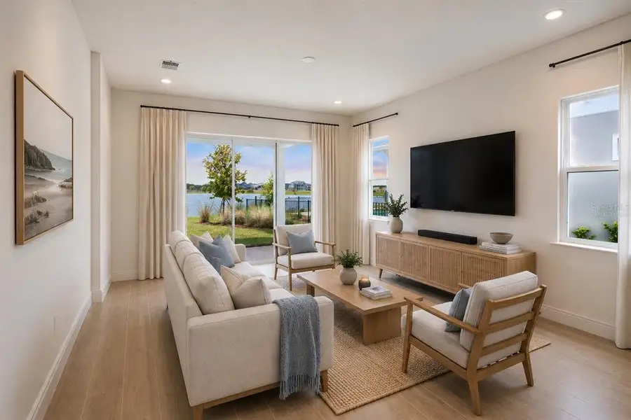 Furnished interior view inside a new home in Laureate Park, Orlando (Image 5).