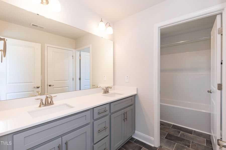 Representative furnished interior of a home built from the 2709 by Adams Homes in The Grove at Ballard, Jacksonville (Image 13).