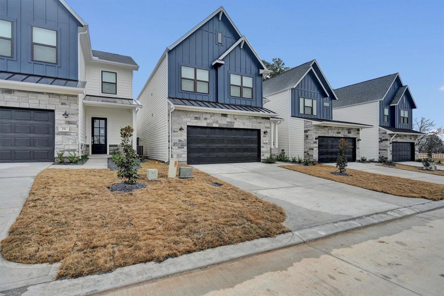 Front exterior of a new home in Summer Place 35', Montgomery, TX, highlighting curb appeal (Image 1). Front exterior of a new home in Summer Place 35', Montgomery, TX, highlighting curb appeal (Image 1).