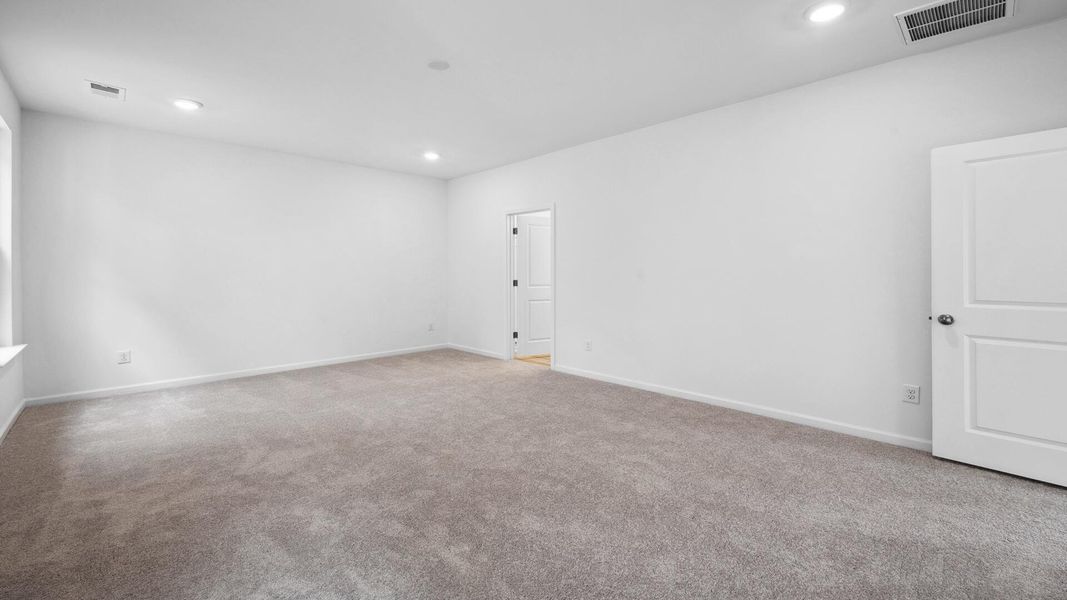 Spacious, unfurnished interior of a new home in Creekside at Andrews, Summerville (Image 21).