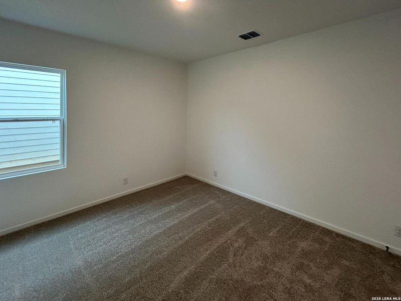 Spacious, unfurnished interior of a new home in Hennersby Hollow, San Antonio (Image 17).
