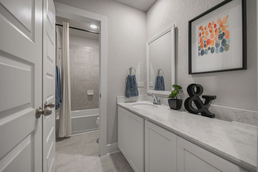 Representative furnished interior of a home built from the Powell by Chesmar Homes in Buffalo Crossing, Cibolo (Image 24).