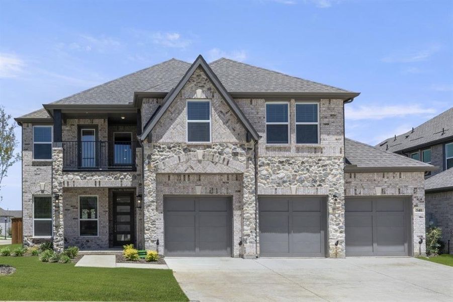 Front exterior of a new home in Spiritas Ranch, Little Elm, TX, highlighting curb appeal (Image 18).