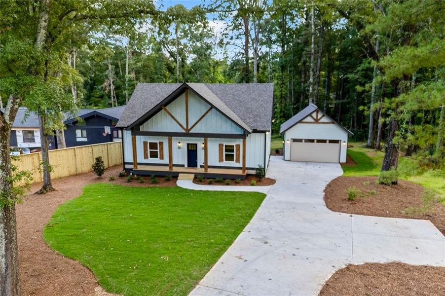 Front exterior of a new home in , Monroe, GA, highlighting curb appeal (Image 26).