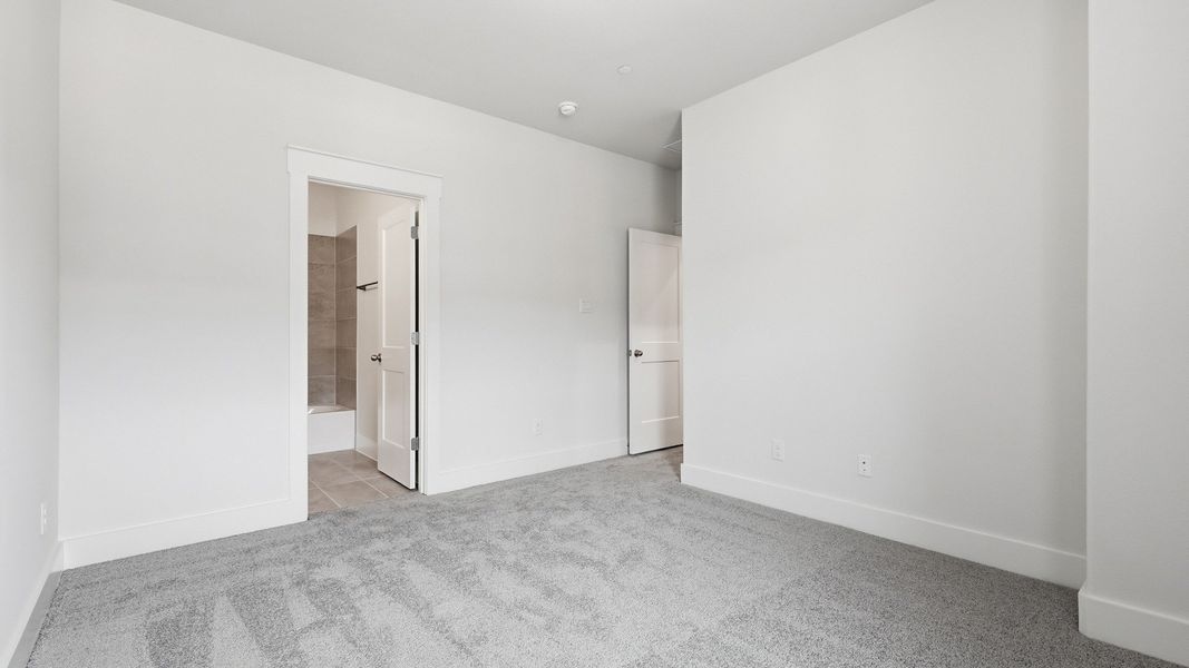 Furnished interior view inside a new home in Collin Creek, Plano (Image 35).