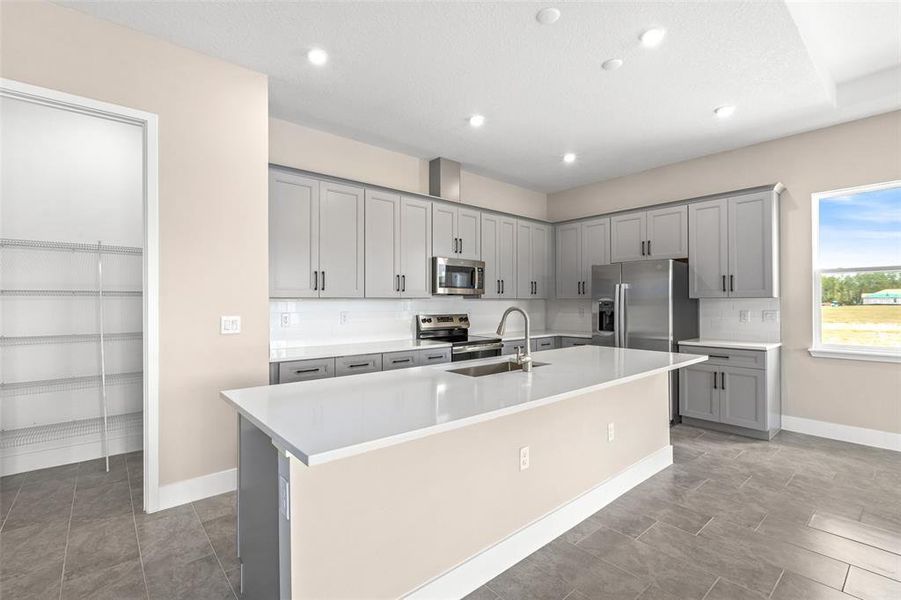 Furnished interior view inside a new home in Gray Hawk at Hole Two, Daytona Beach (Image 9). Furnished interior view inside a new home in Gray Hawk at Hole Two, Daytona Beach (Image 9).