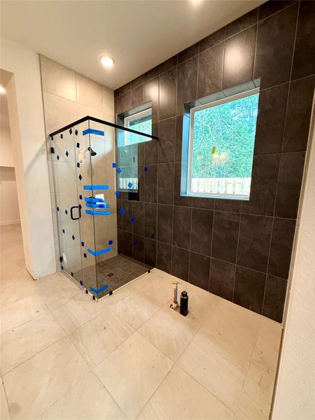 Full wall of tile compliments the freestanding tub and shower! Full wall of tile compliments the freestanding tub and shower!