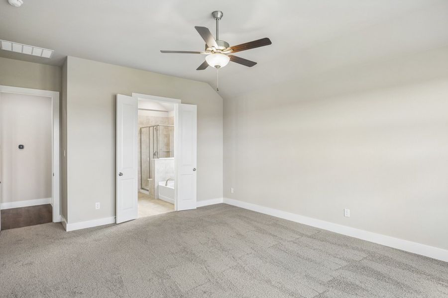 Representative unfurnished interior of a home built from the The Mockingbird by Lillian Custom Homes in Polo Ridge, Forney (Image 40).