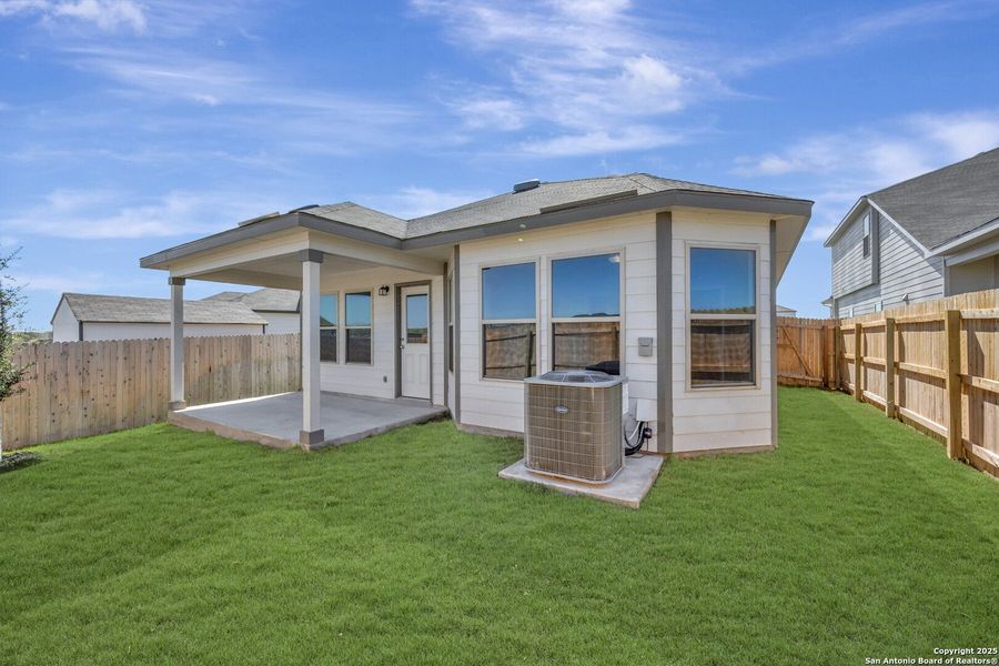 Exterior details and patio area of a home in Park Place, New Braunfels (Image 2).