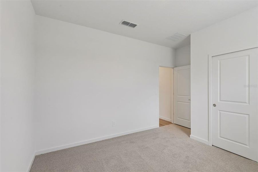 Spacious, unfurnished interior of a new home in Colbert Landings, Palm Coast (Image 11).